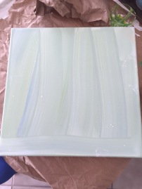 For this project, I use a 12" x 12" canvas that has a light coat of mint green acrylic paint.